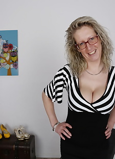  sex images Hot German housewife squeezes her big, big tits , high heels 